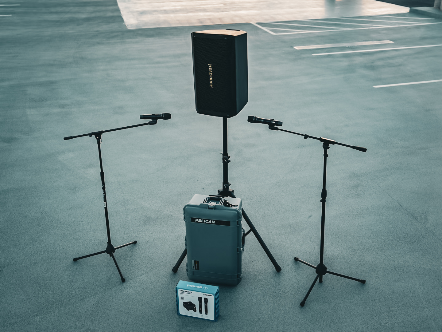 A two-microphone sound package staged on open pavement