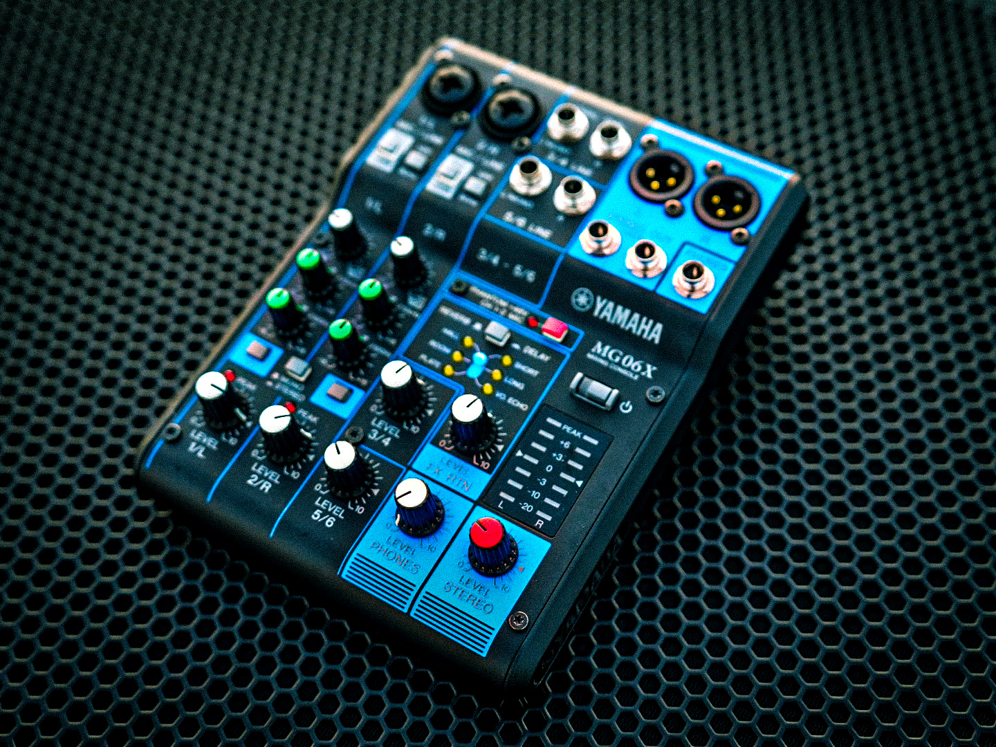 Controls and inputs of a Yamaha MG06X analogue mixer