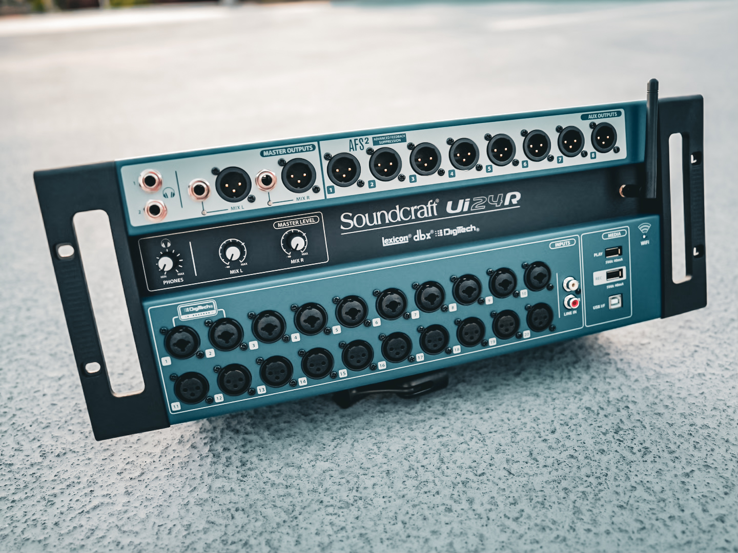 The Soundcraft Ui24R console behind our larger sound packages