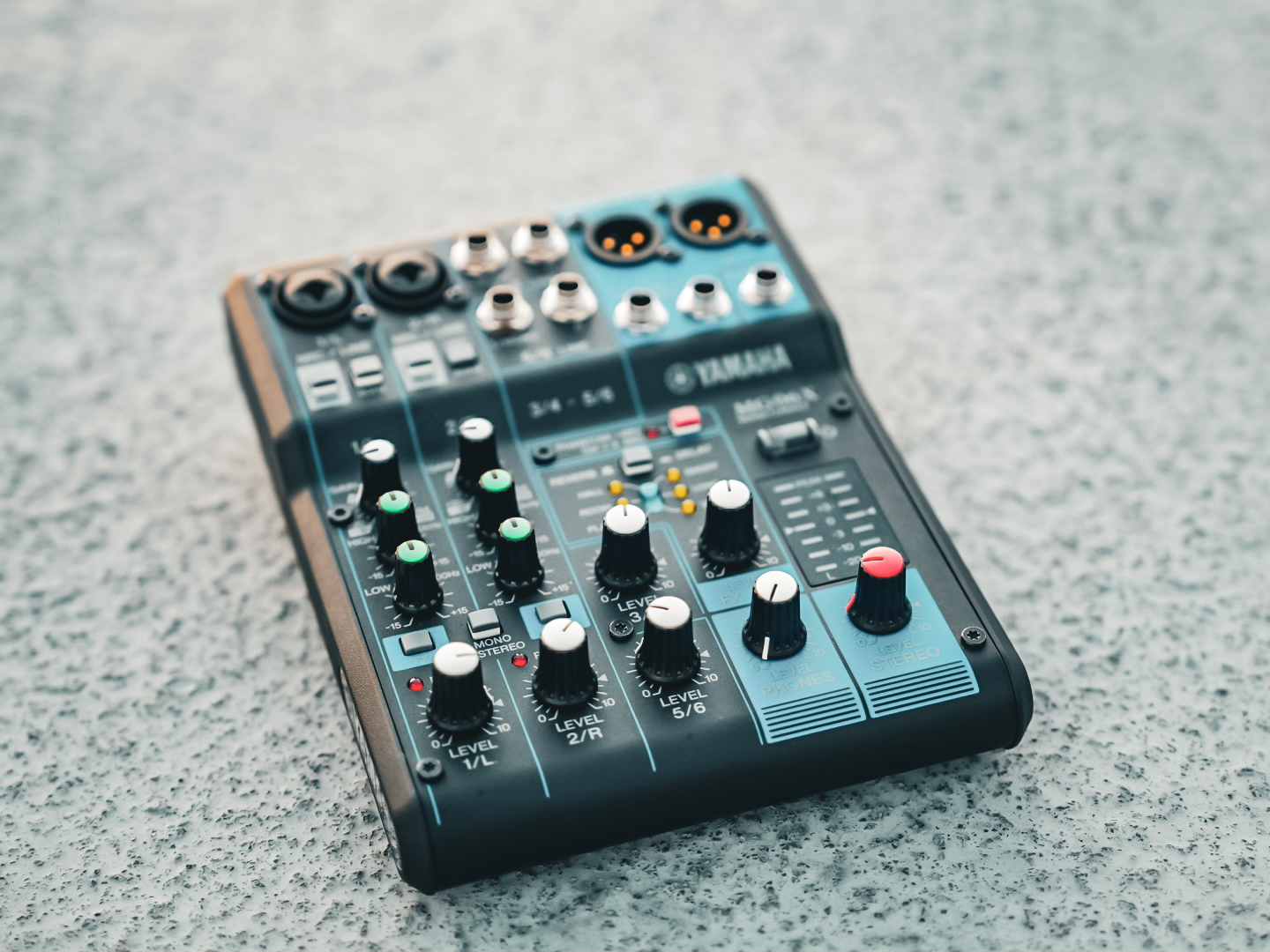 A compact Yamaha analogue mixer with reverb and channel EQ controls